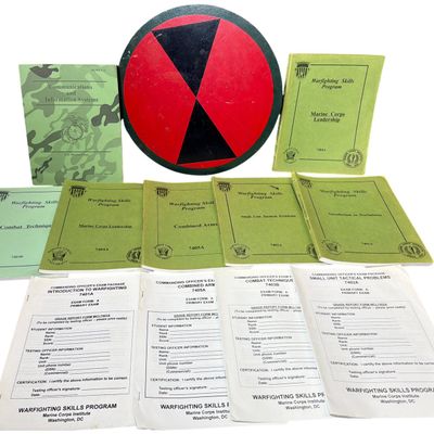 Sale Photo Thumbnail #725: A Collection of USMC Warfighting Skills Program Manuals, Exam Packages, and a Painted Wooden 7th Infantry Division Plaque