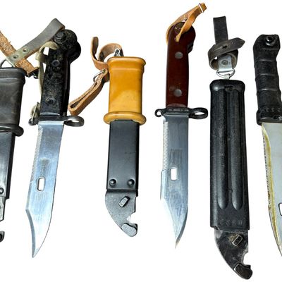 Sale Photo Thumbnail #664: A Collection of Cold War Era AKM Series Bayonets and Wire Cutter Scabbards
