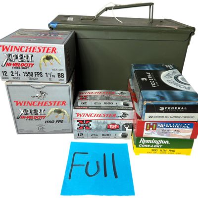 Sale Photo Thumbnail #135: An Assortment of .300 Win Mag and 12-Gauge Ammunition with Metal Storage Can