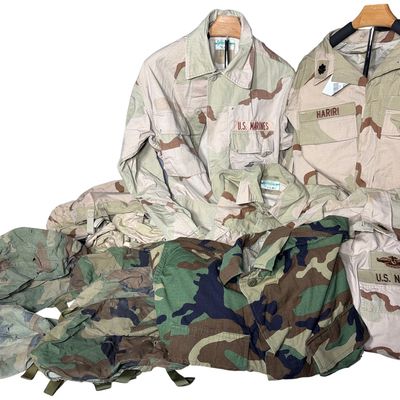 Sale Photo Thumbnail #680: A Collection of US Military Desert and Woodland Camouflage Uniform Coats and PASGT Helmet Covers