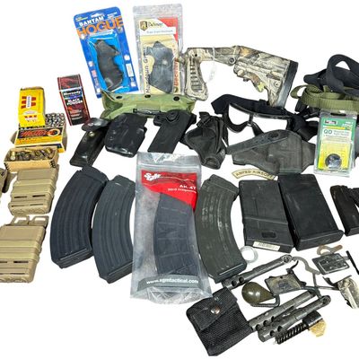 Sale Photo Thumbnail #727: A Collection of Firearms Accessories, Magazines, and Ammunition Including Knoxx Adjustable Stock