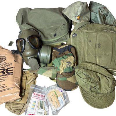 Sale Photo Thumbnail #722: A Collection of United States Military Field Equipment and International Headgear