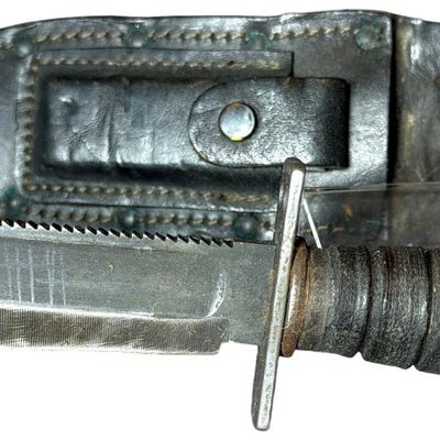 Sale Photo Thumbnail #579: Camillus Pilot's Survival Knife Dated November 1968 with Leather Sheath and Sharpening Stone