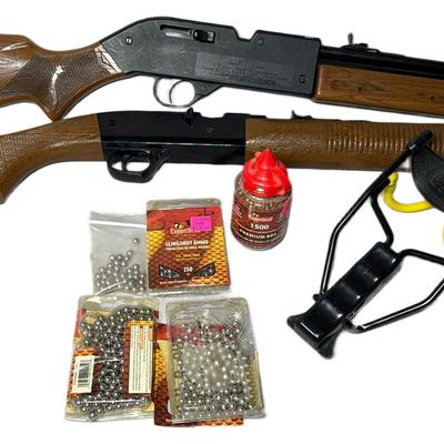 Sale Photo Thumbnail #139: A Collection of Two Crosman Pump Action Air Rifles with One Slingshot and Ammunition