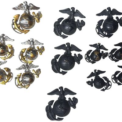 Sale Photo Thumbnail #553: A Collection of USMC Eagle Globe and Anchor Insignia including Hilborn-Hamburger and Vanguard Examples