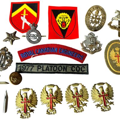 Sale Photo Thumbnail #698: A Collection of British Commonwealth and Spanish Military Insignia