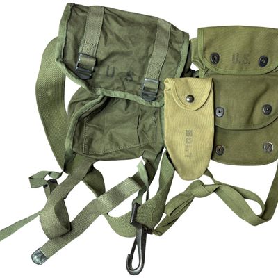 Sale Photo Thumbnail #560: A Trio of US Army Field Gear Including M-1945 Cargo Pack and 1944 Froehlich Pouch