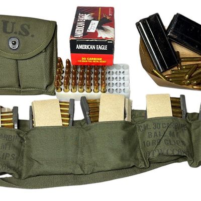 Sale Photo Thumbnail #109: Collection of US Military .30 Caliber M1 Carbine Ammunition, Bandolier, Magazines, and Pouch