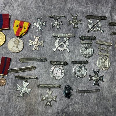 Sale Photo Thumbnail #353: A Collection of United States Marine Corps Medals and Marksmanship Qualification Badges