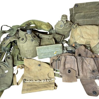 Sale Photo Thumbnail #663: A Collection of US Military Field Gear Including M1 Garand Cartridge Belt and 1944 Protective Cover