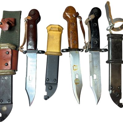 Sale Photo Thumbnail #670: A Trio of Polish AKM Type I and Type II Bayonets with Scabbards
