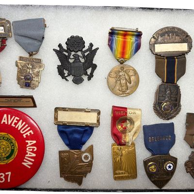 Sale Photo Thumbnail #231: WWI Lot Including - Officer's Eagle Hat insignia, Victory Medal & 9 American Legion Reunion badges 1926-1941