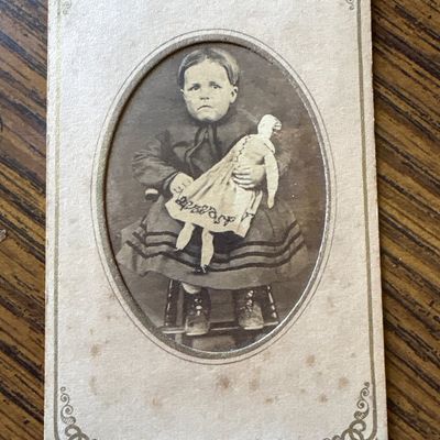 Sale Photo Thumbnail #180: Civil War Era CDV Portrait of a Young Child with Cloth Doll