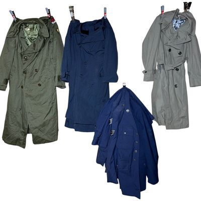 Sale Photo Thumbnail #742: An Assortment of U.S. Military Uniforms and Equipment Including Army and Air Force Tunics and Trench Coats