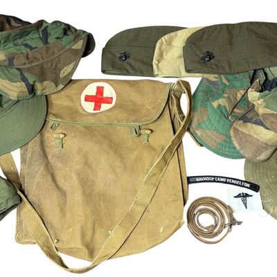 Sale Photo Thumbnail #650: A Collection of United States Marine Corps and Navy Medical Headgear and Field Gear