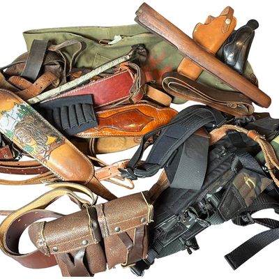 Sale Photo Thumbnail #721: A Collection of Vintage Gun Slings, Holsters, Military Belts, and Rifle Forend