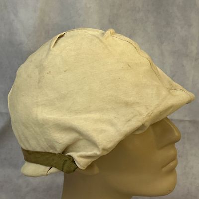 Sale Photo Thumbnail #279: WWII U.S. M1 Front Seam Swivel Bale Helmet with RARE Winter Over White Cover