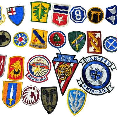 Sale Photo Thumbnail #702: A Collection of United States Military Cloth Insignia and Unit Patches