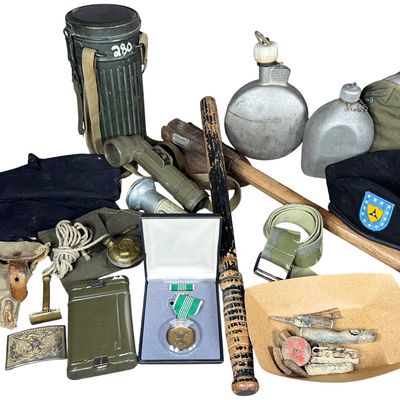 Sale Photo Thumbnail #726: A Collection of US and European Military Field Gear, Medals, and Trench Art