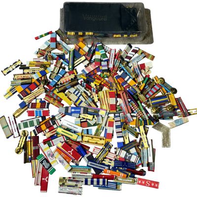 Sale Photo Thumbnail #729: A Large Collection of U.S. Military Service Ribbons and Vanguard U.S. Navy Commander Medical Corps Shoulder Boards