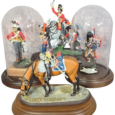 Sale Photo Thumbnail #648: A Collection of Four Hand-Painted British Military Miniatures Including Battle of Waterloo Diorama