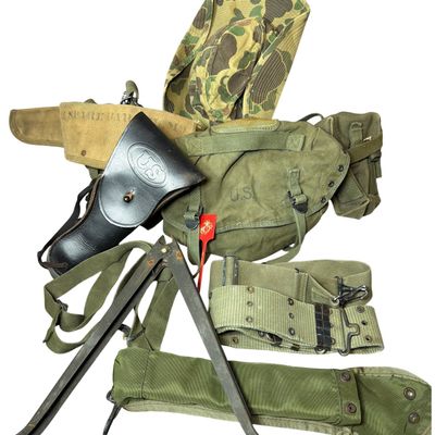 Sale Photo Thumbnail #630: A Collection of United States Military Field Equipment and Web Gear Including Colt Marked Tripod and M1916 Holster