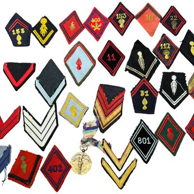 Sale Photo Thumbnail #337: A Collection of French Military Uniform Insignia and a Belgian World War I Victory Medal