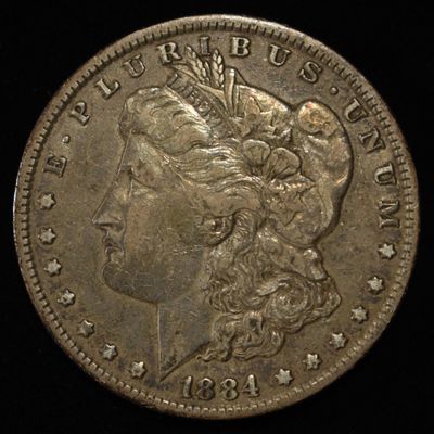 Sale Photo Thumbnail #70: 1884 MORGAN DOLLAR