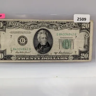 Sale Photo Thumbnail #834: Series 1950 B $20 United States Federal Reserve Note in a protective sleeve.