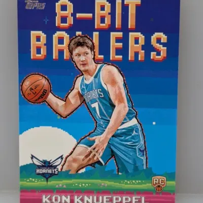 Sale Photo Thumbnail #339: Topps 8-Bit Ballers Kon Knueppel rookie basketball trading card featuring pixelated arcade-style graphics and Charlotte Hornets branding.
