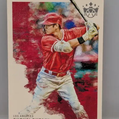 Sale Photo Thumbnail #739: Panini Diamond Kings Shohei Ohtani trading card, featuring artistic painted artwork of him batting in his Los Angeles Angels uniform.