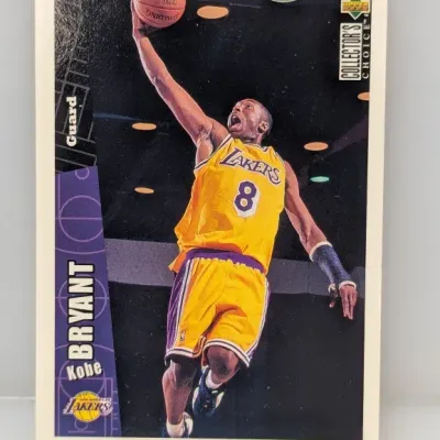 Sale Photo Thumbnail #769: 1996-97 Upper Deck Collector's Choice Kobe Bryant rookie basketball card (#267) featuring him in his Los Angeles Lakers uniform.
