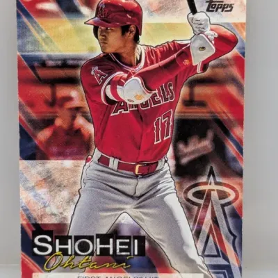 Sale Photo Thumbnail #741: Topps Shohei Ohtani trading card featuring his "First Angels Hit" in good condition.