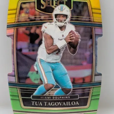 Sale Photo Thumbnail #161: Panini Select die-cut Tua Tagovailoa Miami Dolphins trading card, featuring a multicolor refract border.