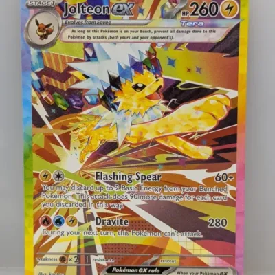 Sale Photo Thumbnail #60: Jolteon ex Pokémon Trading Card Game card, full-art Tera type edition numbered 153/131, in excellent condition.