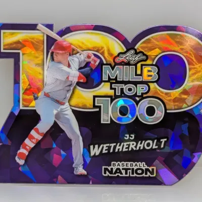 Sale Photo Thumbnail #31: Leaf MiLB Top 100 die-cut trading card featuring JJ Wetherholt with a purple foil and holographic finish.