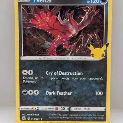Sale Photo Thumbnail #607: Pokémon Celebrations 25th Anniversary Yveltal holofoil trading card, number 019/025, from 2021.