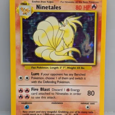 Sale Photo Thumbnail #33: 1999 Pokémon Base Set holographic Ninetales trading card (12/102), illustrated by Ken Sugimori.