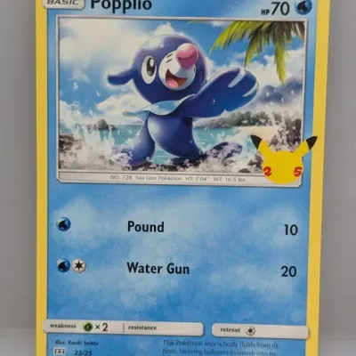 Sale Photo Thumbnail #728: 2021 Pokémon McDonald's 25th Anniversary Collection Popplio card, numbered 23/25, featuring a 25th anniversary Pikachu stamp.