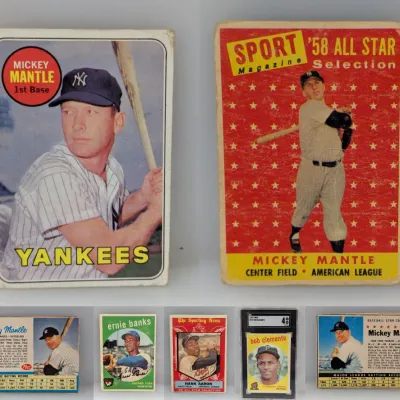 Sale Photo Thumbnail #3: Collection of vintage baseball cards featuring legendary Hall of Famers including Mickey Mantle, Ernie Banks, Hank Aaron, and a SGC 4 graded Roberto Clemente.
