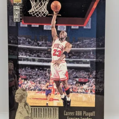 Sale Photo Thumbnail #120: 1994-95 Upper Deck Collector's Choice Michael Jordan "Career NBA Playoff Scoring Leader" trading card #23, in good condition.