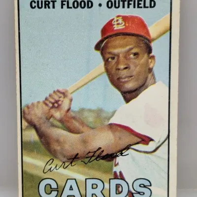 Sale Photo Thumbnail #503: 1968 Topps Curt Flood baseball card #215, featuring the St. Louis Cardinals outfielder in a batting pose.