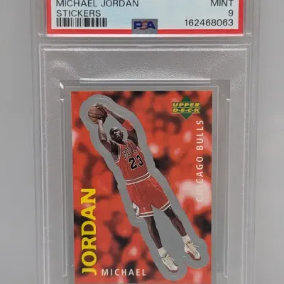 Sale Photo Thumbnail #62: PSA 9 Mint graded 1997 Upper Deck International Michael Jordan sticker card #205.