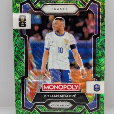 Sale Photo Thumbnail #76: Panini Prizm Monopoly Prizm green parallel trading card featuring Kylian Mbappé representing France.