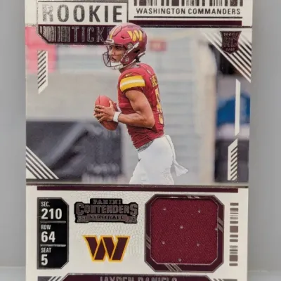 Sale Photo Thumbnail #765: 2024 Panini Contenders Rookie Ticket Jayden Daniels football card featuring an embedded burgundy jersey relic swatch.
