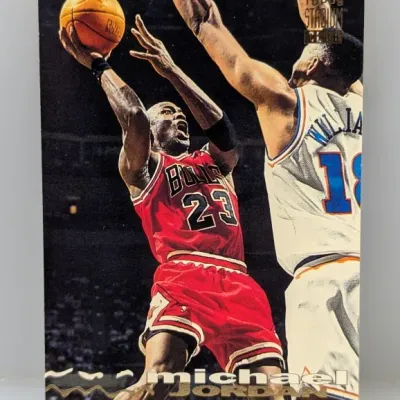 Sale Photo Thumbnail #467: 1993-94 Topps Stadium Club Michael Jordan #169 trading card featuring a action photo in his Chicago Bulls uniform.