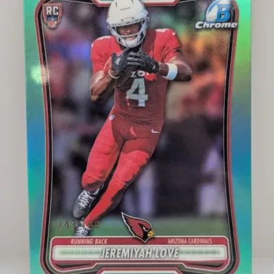 Sale Photo Thumbnail #84: Bowman Chrome Jeremiyah Love Arizona Cardinals rookie trading card with a teal chrome border, serial numbered 143/199.