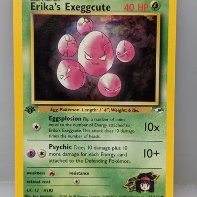 Sale Photo Thumbnail #388: 1st Edition Erika's Exeggcute #77/132 Pokémon trading card from the Gym Heroes set, published by Wizards of the Coast in 2000.