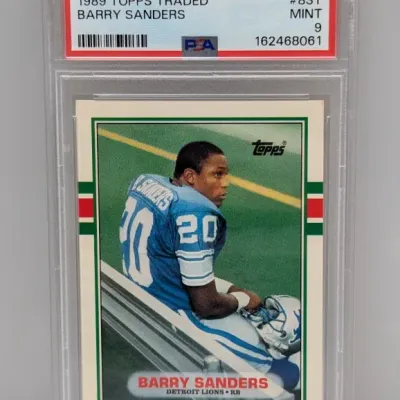 Sale Photo Thumbnail #77: PSA-graded 9 Mint 1989 Topps Traded Barry Sanders rookie football card, #83T.