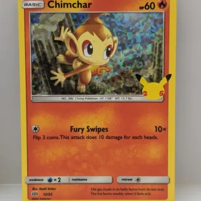 Sale Photo Thumbnail #680: Pokémon Chimchar holographic trading card from the 25th Anniversary McDonald's Collection, set number 12/25.